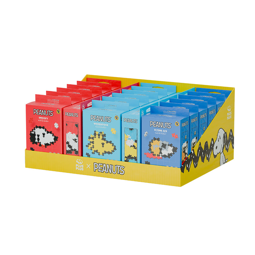 24 Piece Peanuts® Puzzle by Number® Box Assortment in a yellow display tray
