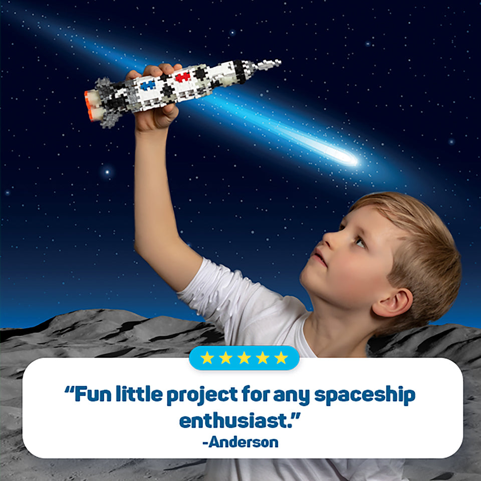 Tube - 240 pc - Saturn V Rocket review: boy holding the rocket