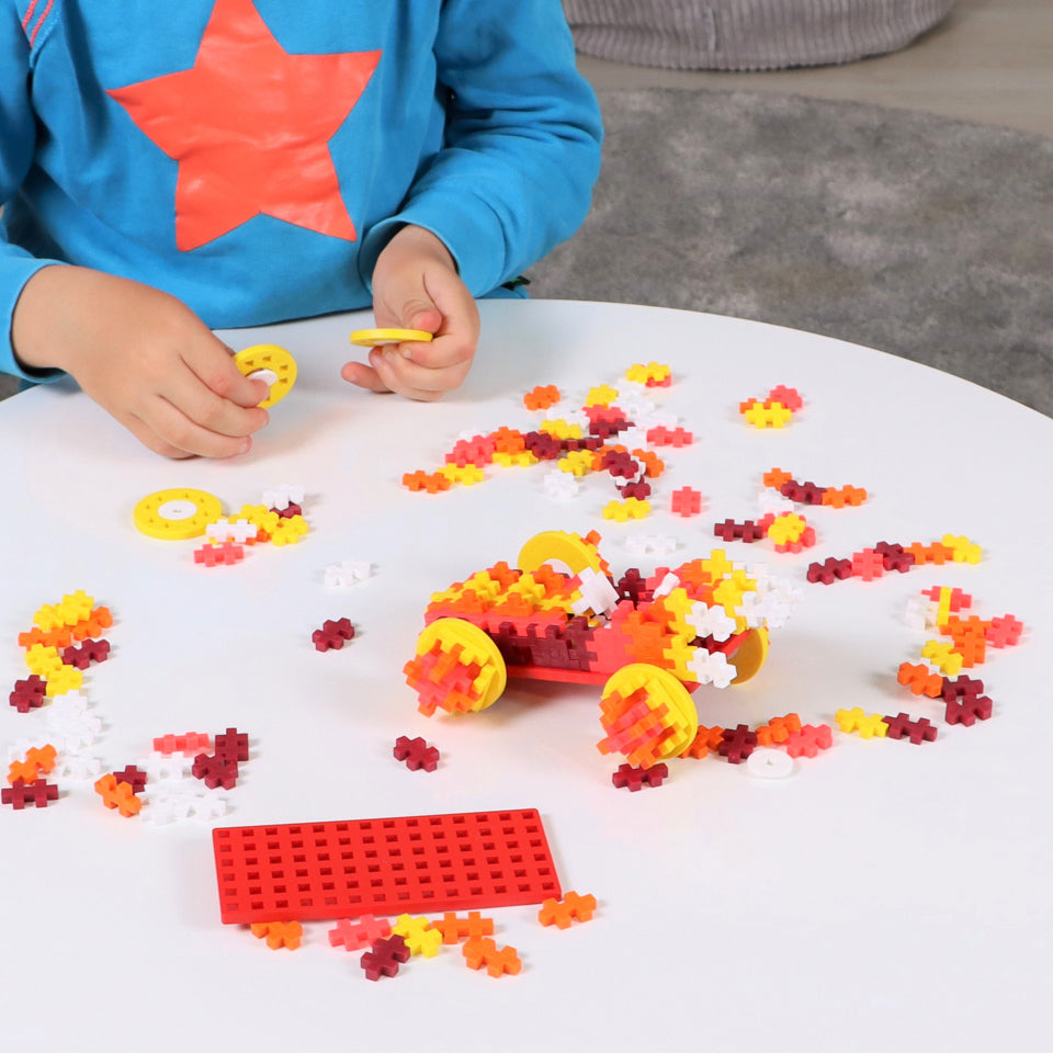 Tube - Color Cars - Fire pieces and baseplate on a table