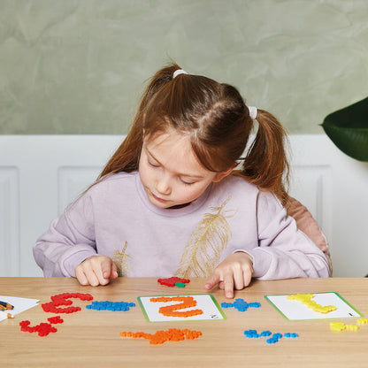 Learn To Build - ABC & 123: girl building numbers