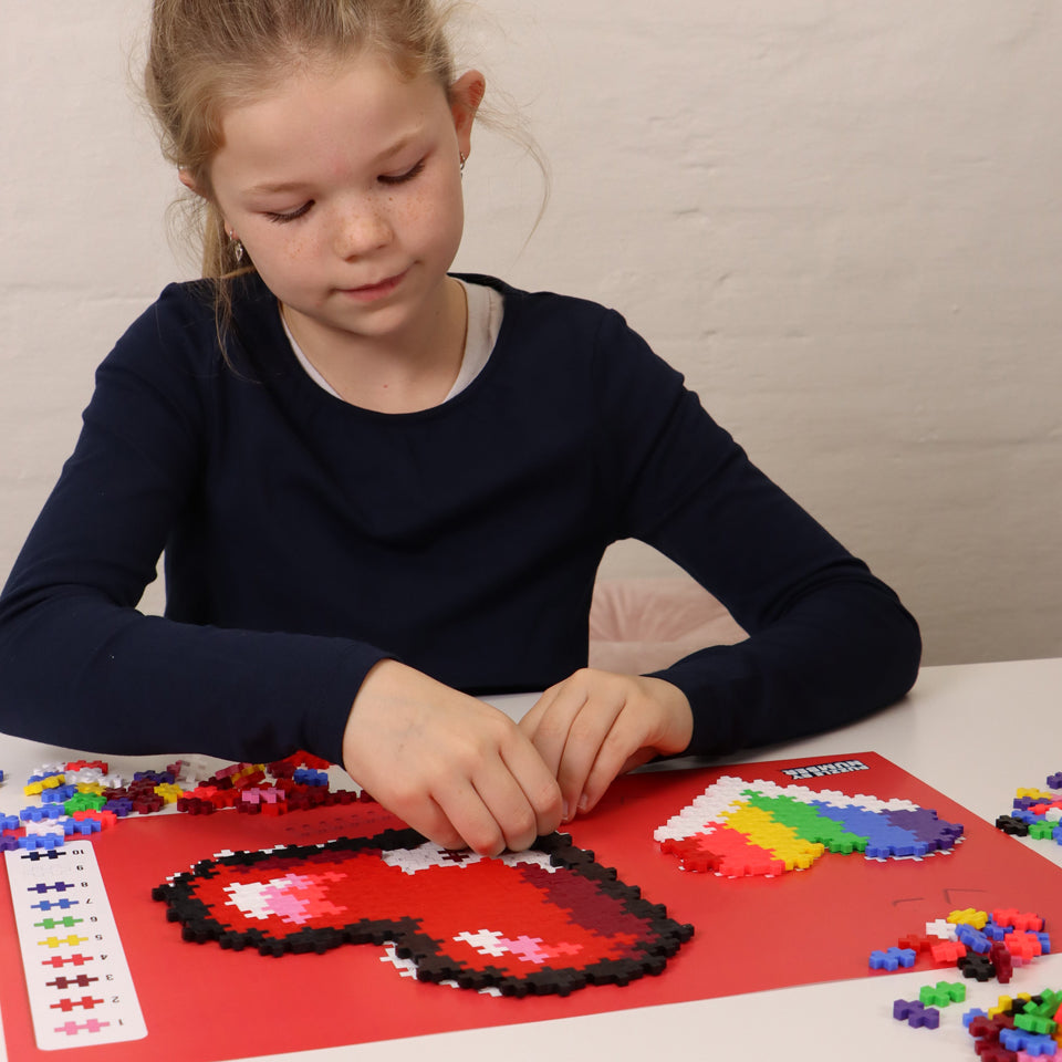 Puzzle By Number® - 250 pc Hearts: girl building a heart
