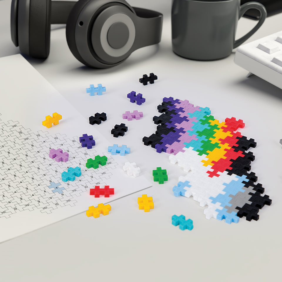 Puzzle By Number®- 500 pc Rainbow being built on a desk