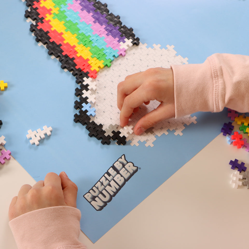 Puzzle By Number®- 500 pc Rainbow: hands placing pieces