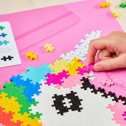 Puzzle By Number® - 250 pc Unicorn: hand building the puzzle