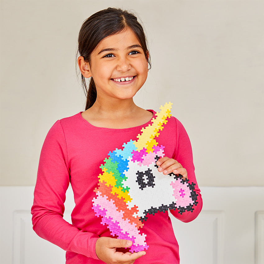 Puzzle By Number® - 250 pc Unicorn: girl holding her finished unicorn