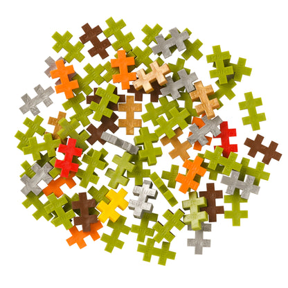 Tube - Ogre: pile of green, brown, orange and gray pieces