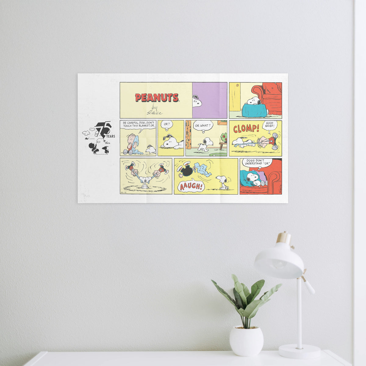 Snoopy - 275 pc Puzzle By Number® Peanuts comic build displayed on a wall